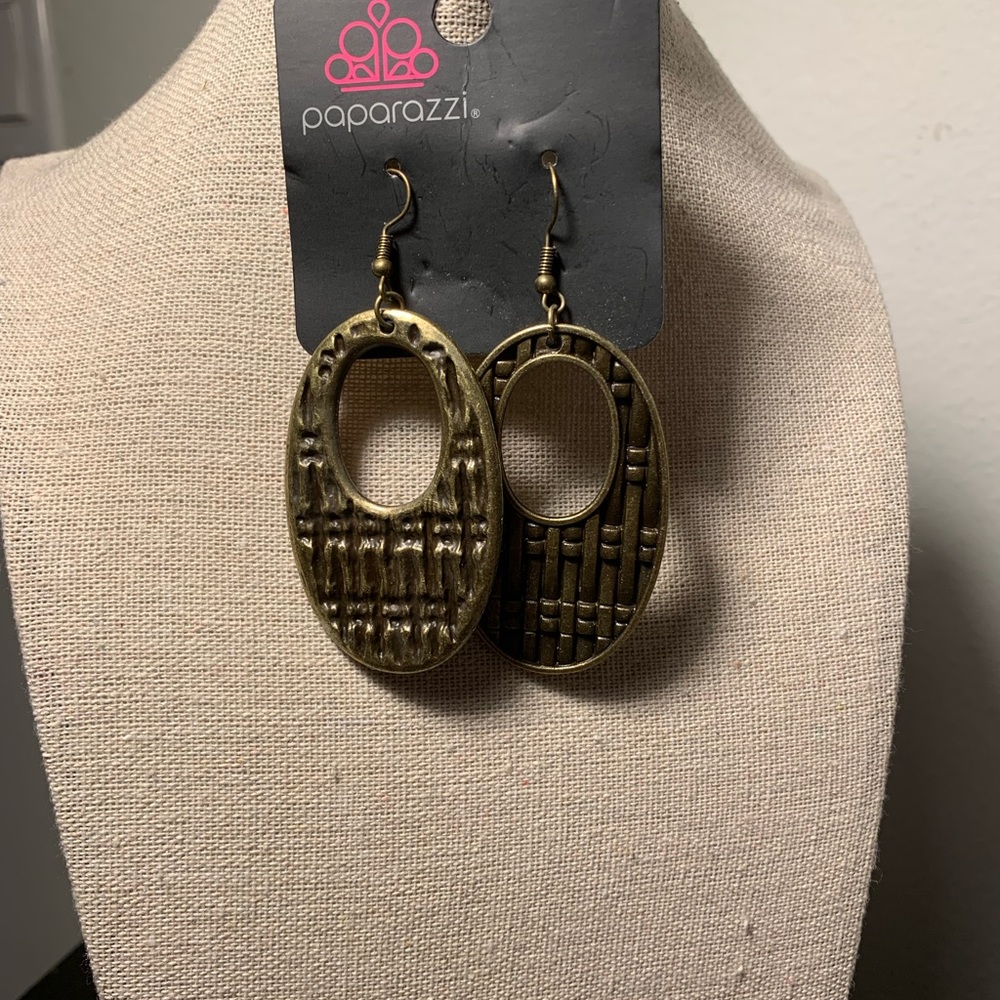 Teardrop shape brass earrings.